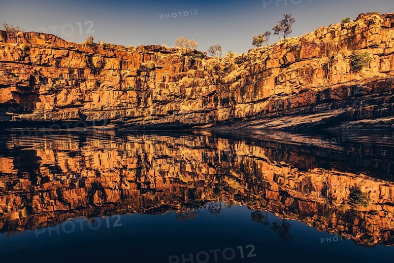Bell Gorge waterfall, a body of water in north-west Australia in the Kimberley. Sunrise in the outback, Australia