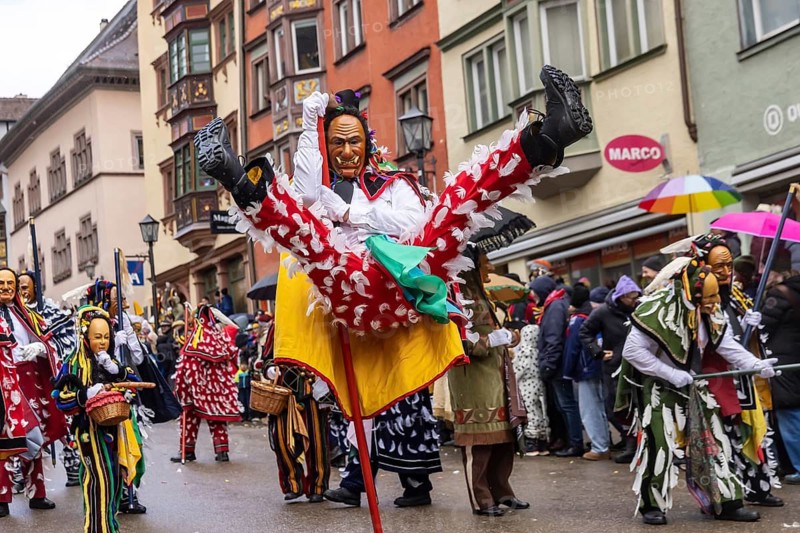 The highlight of the Swabian-Alemannic carnival is the fool's jump in Rottweil. Around 4000 fools jump through the historic Black Gate. The figure of Federahannes, who makes huge jumps, is distinctive. Rottweil, Black Forest, Baden-Württemberg, Germany