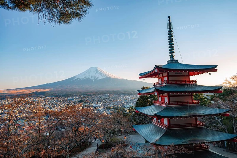 Five-story pagoda of a Shinto Shrine, Chureito Pagoda, with views of Fujiyoshida City and Mount Fuji volcano at sunset, Arakura Fuji Sengen Shrine, Arakurayama Sengen Park, Yamanashi Prefecture, Japan