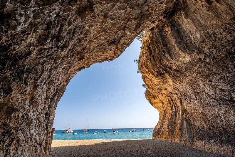 Rock cave on the beach at Cala Luna, Golfo di Orosei, Baunei, Sardinia, Italy