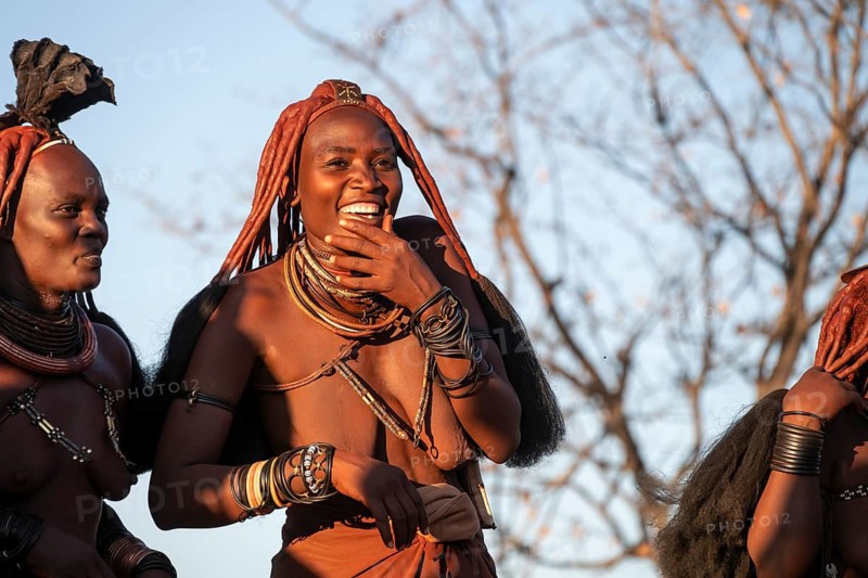 Himba woman dancing euphorically, traditional dance, traditional Himba village, Kaokoveld, Kunene, Namibia