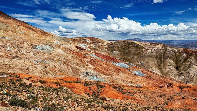 Large, rocky hills under a sky with partial clouds, The silver mines of Potosi on Cerro Rico in Bolivia