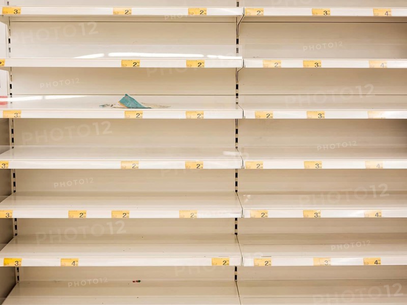 Empty shelves in the store due to panic caused by coronavirus - prices in Polish currency (PLN)