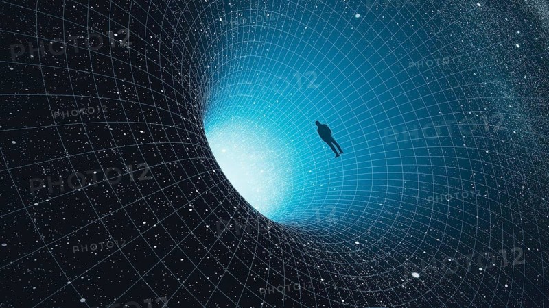 A man stands at the edge of a black hole, gazing into the depths of the universe, surrounded by stars in a mesmerizing cosmic abyss
