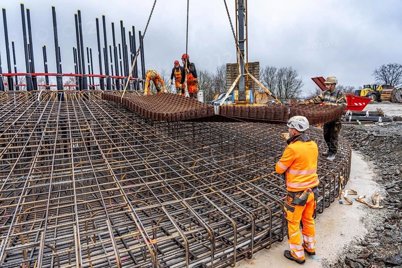 Assembly of reinforcing steel for the reinforced concrete foundation of a wind turbine, a mesh of rebar and rebar mesh, over 100 tons of reinforcing steel were used, the wind turbine will have a hub height of 160 meters, part of a new wind farm in Sauerland, near Balve, North Rhine-Westphalia, Germany