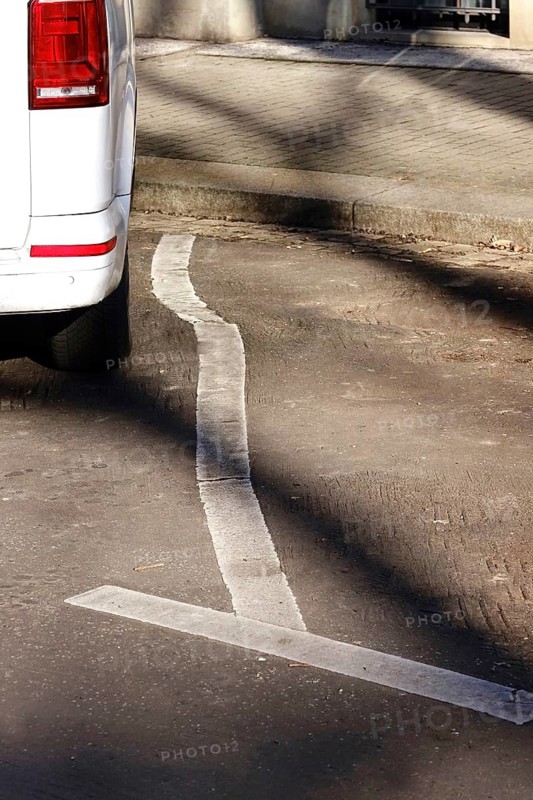 Parking line displaced by heat in summer, Germany