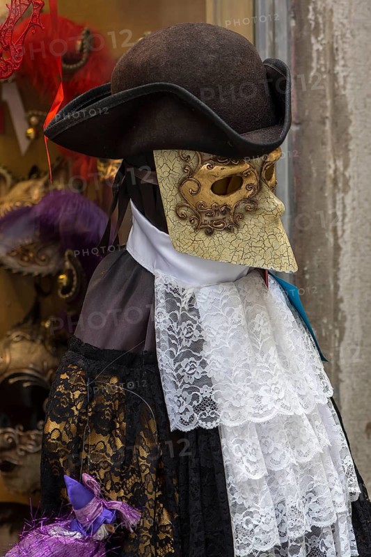 Venetian carnival costume in front of a shop, Venice, Veneto, Italy