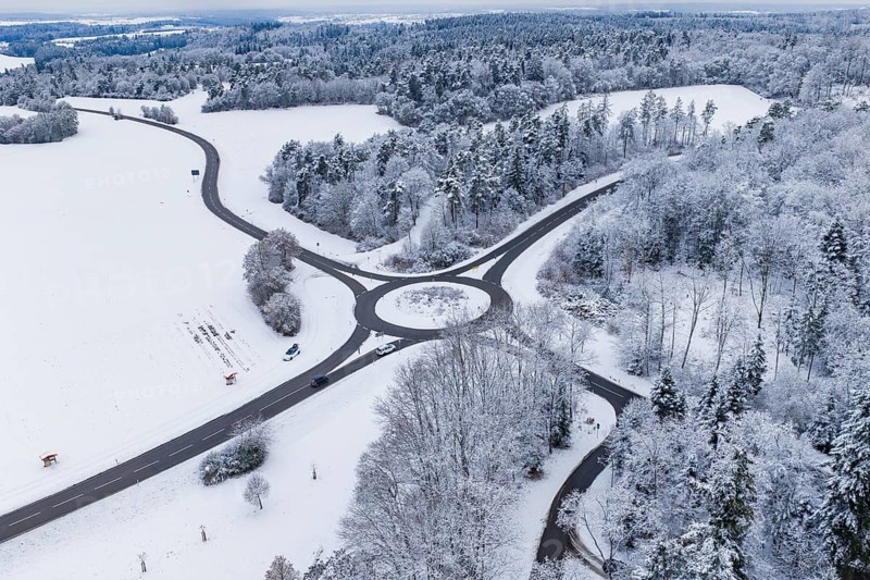 Roundabout in snowy landscape, seen from the air, Gechingen, Calw district, Germany