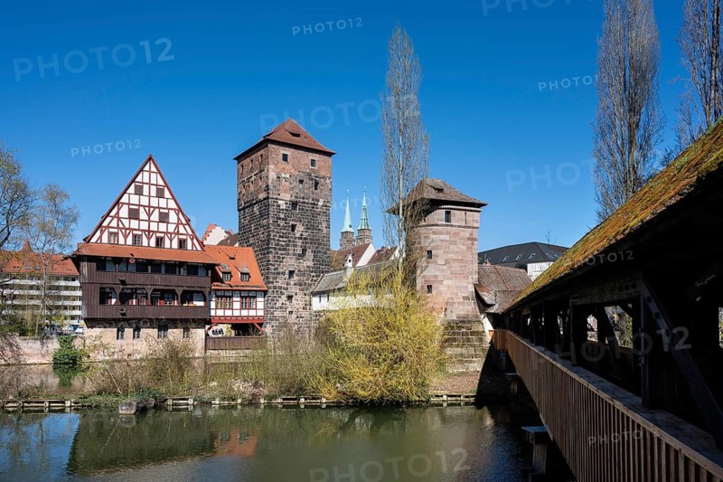 View of the Pegnitz river with the Weinstadel half-timbered building, the water tower and Henkersteg with the executioner's tower, on the far right the covered Maxbrücke in the old town of Nuremberg, Middle Franconia, Franconia, Bavaria, Germany