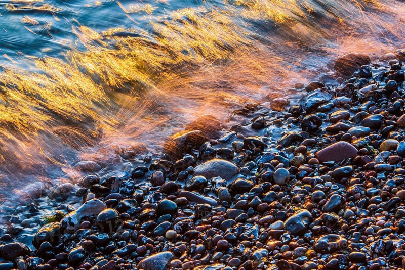 Wave play at sunrise on the chalk coast in Jasmund National Park, Rügen, Sassnitz, Mecklenburg-Western Pomerania, Germany