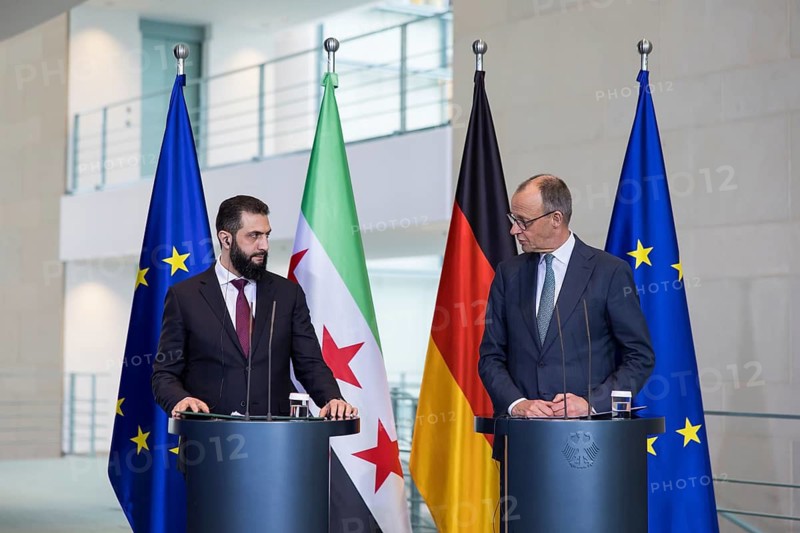 Ahmed al-Sharaa (President of the Syrian Arab Republic) and Friedrich Merz (Chancellor of the Federal Republic of Germany, CDU) at a press conference after a one-on-one meeting at the Federal Chancellery, Berlin, 30 March 2026
