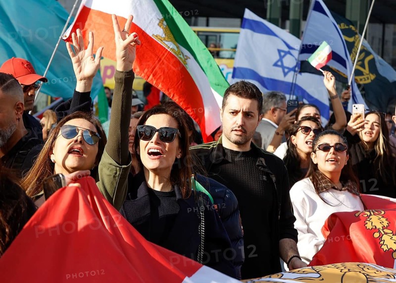 Iranians demonstrate on the day of the US and Israeli attack on Iran in Berlin, 28.02.2026. People cheer the rumor that Obermullah Khamenei died in the attack, Berlin, Berlin, Germany