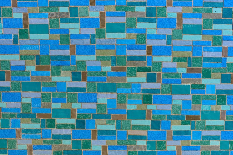 A detailed image of a mosaic wall consisting of blue and green tiles in geometric patterns, Philippquelle, Kurstadt Bad Orb, Spessart nature park Park, Main Kinzig Kreis, Hesse, Germany