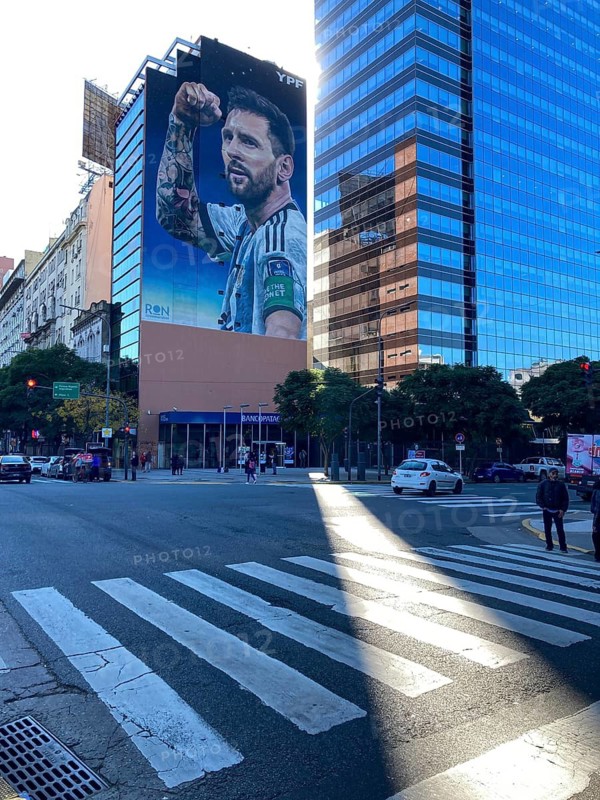 Giant photograph of Lionel Messi in winning pose, advertising for YPF, Avenida 9 de Julio, centre of Buenos Aires, Argentina