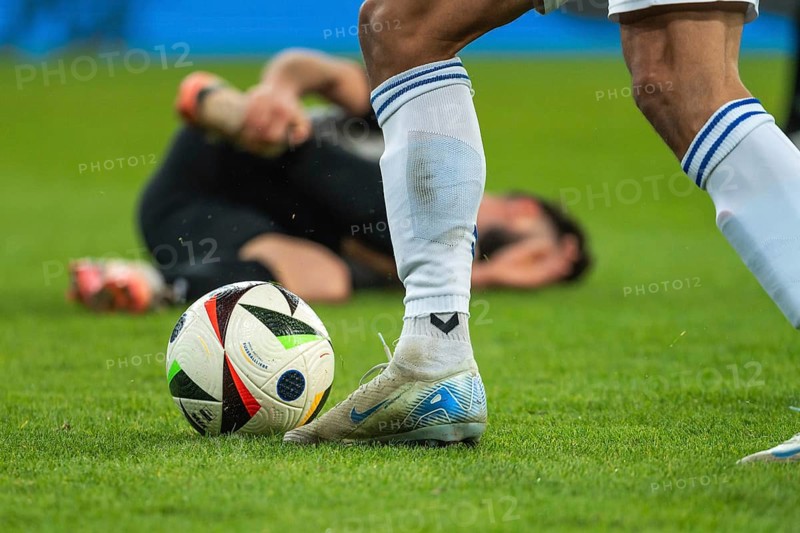 LUBIN, POLAND - NOVEMBER 22, 2024: Football match Polish PKO Ekstraklasa between KGHM Zaglebie Lubin vs Motor Lublin. Detail of player's leg and ball.