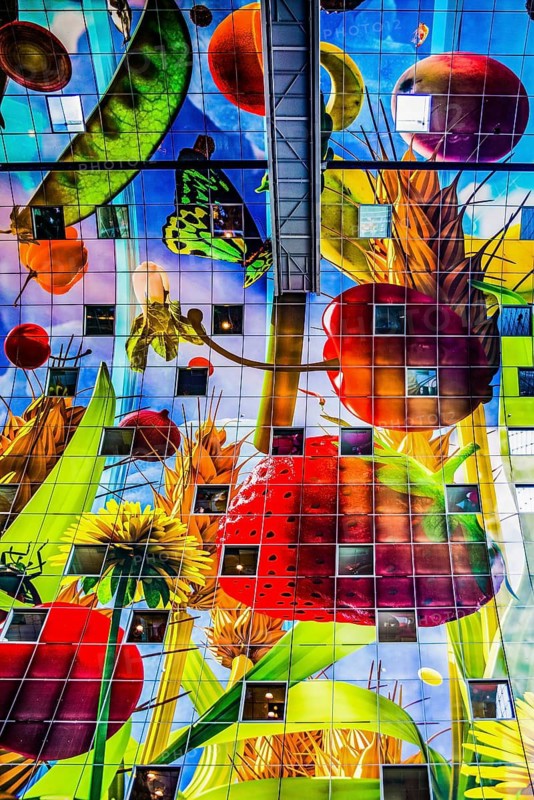 Markthal from 2014, offers over 100 food stalls and delicatessens with spectacular ceiling fresco cornucopia, Horn of Plenty by Arno Coenen and Iris Roskam, Rotterdam, the Netherlands