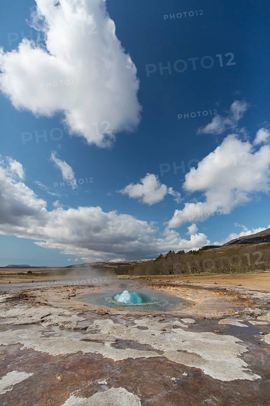 Strokkur is a fountain geyser located in a geothermal area in the southwest part of Iceland. It is one of Iceland's most famous geysers. It is erupting once every 8-10 minutes