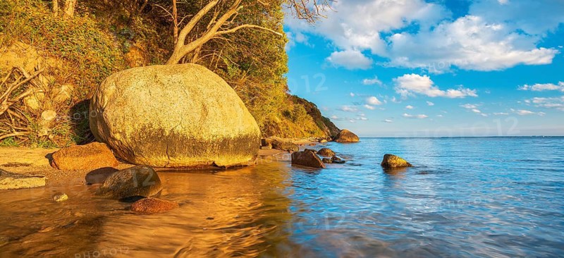 Coastal landscape with large boulders on the Baltic Sea beach in the evening light, Mönchgut Nature Reserve, Groß Zicker, Mönchgut Peninsula, Rügen Island, Mecklenburg-Western Pomerania, Germany
