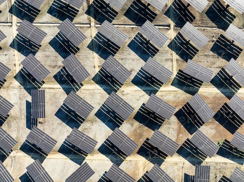 Rows of solar panels at a photovoltaic plant near Vejer de la Frontera. Aerial view. Drone shot. Cádiz province, Andalusia, Spain