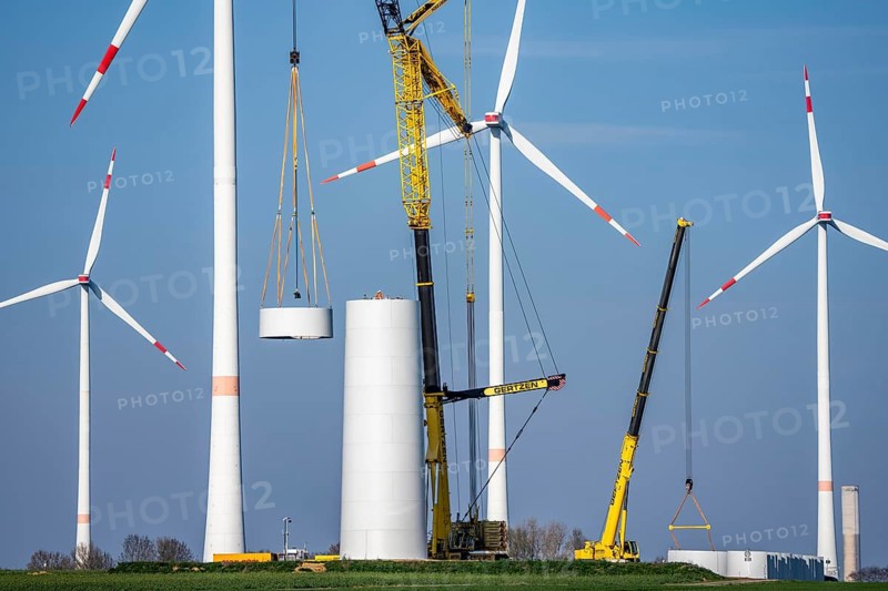 Construction site of the new Bedburg 3 wind farm, on recultivated open-cast mining site, 9 wind power plants with an output of 60 megawatts are being built, installation of the wind turbine tower operated by RWE and the city of Bedburg, North Rhine-Westphalia, Germany