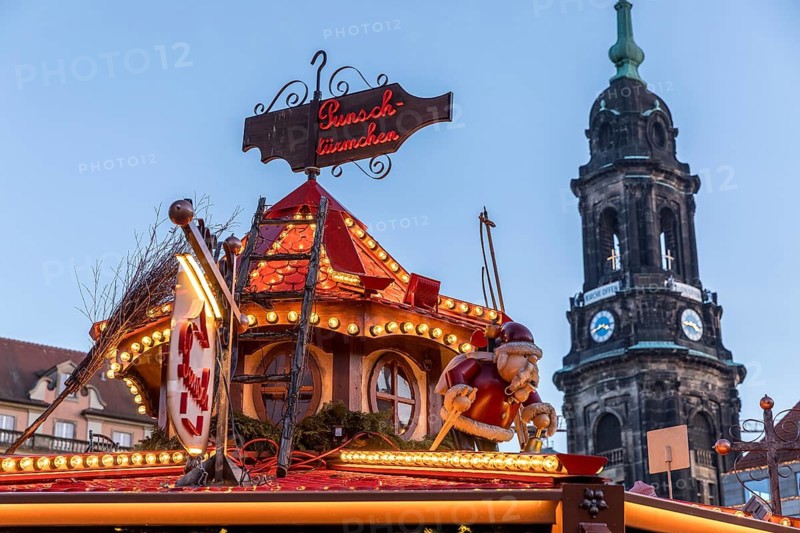 Detailed decoration on the stalls of the Christmas market, with the Kreuzkirche tower in the background, Striezelmarkt, Dresden, Saxony, Germany