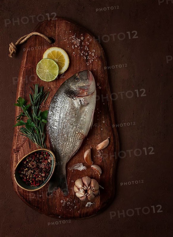 Fresh, raw dorado fish, top view, no people