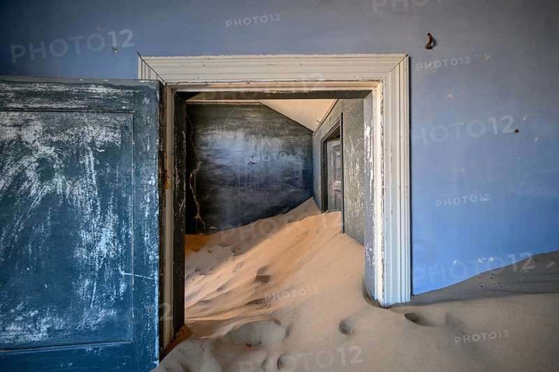 Former dwelling house full of sand, Kolmanskop, restricted diamond area, Karas region, Namibia