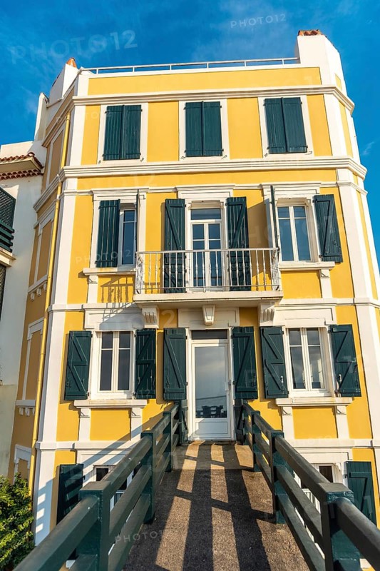The beautiful buildings of the Grande Plage in Saint Jean de Luz at sunset, vacation in the south of France, French Basque Country. France