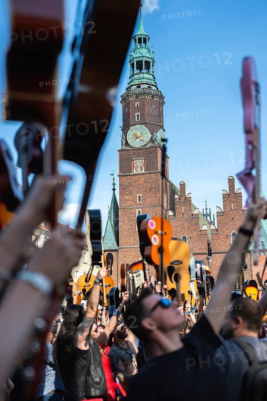 WROCLAW, POLAND - MAY 1, 2025: World Guitar Record concert, 8122 participants played Jimi Hendrix's song Hey Joe on guitars in the Wroclaw market square