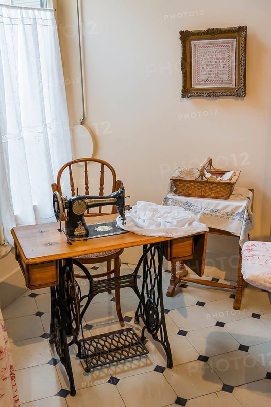 Antique sewing room in an old building, handicraft, needlework, sewing