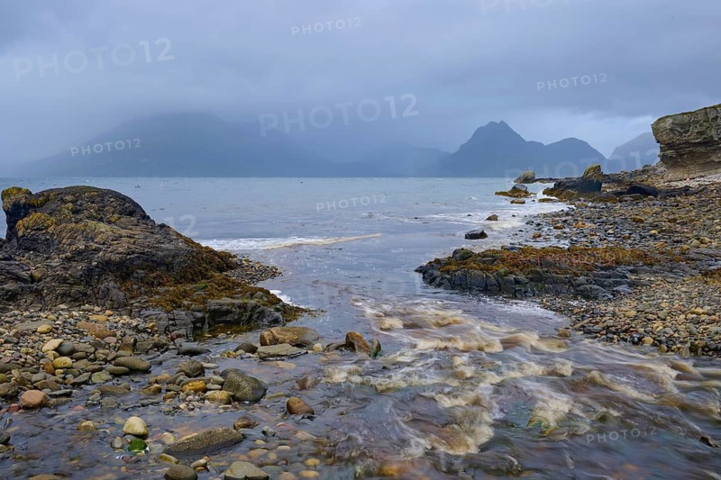 Rocky coast with running water and a cloudy sky, Elgol Beach, Elgol, Isle of Skye, Scotland, United Kingdom, Great Britain