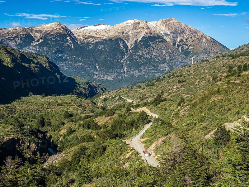 Road Carretera Austral south of Cochrane, mountain pass, driving bus, Patagonia, Chile