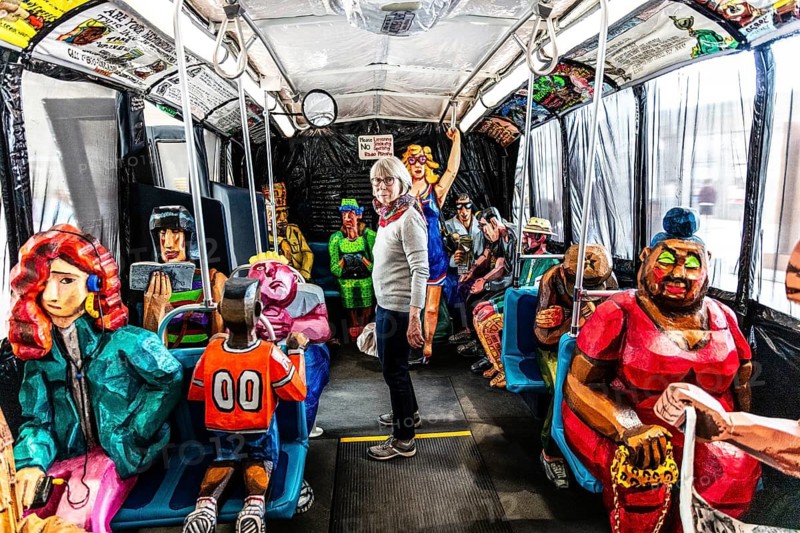 Sculpture The Bus by artist Red Grooms, depicting hectic city life with various passengers, FENIX, museum about migration, in a historic warehouse in Katendrecht, hub for overseas emigrants, Rotterdam, Netherlands