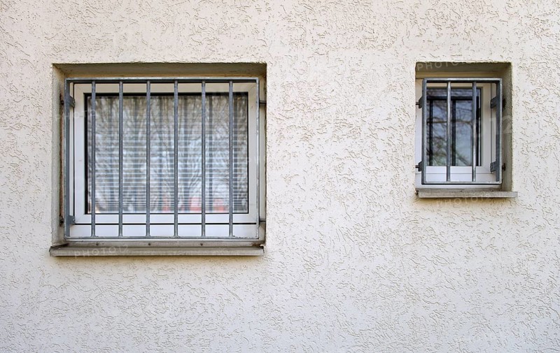 Grille, burglary protection, steel grid against burglary in front of a window on a house, house wall, Stuttgart, Baden-Württemberg, Germany