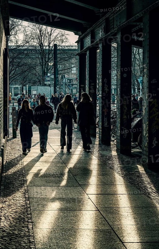 Passers-by below the S-Bahn overpass at Hakeschen Markt, Berlin, Germany