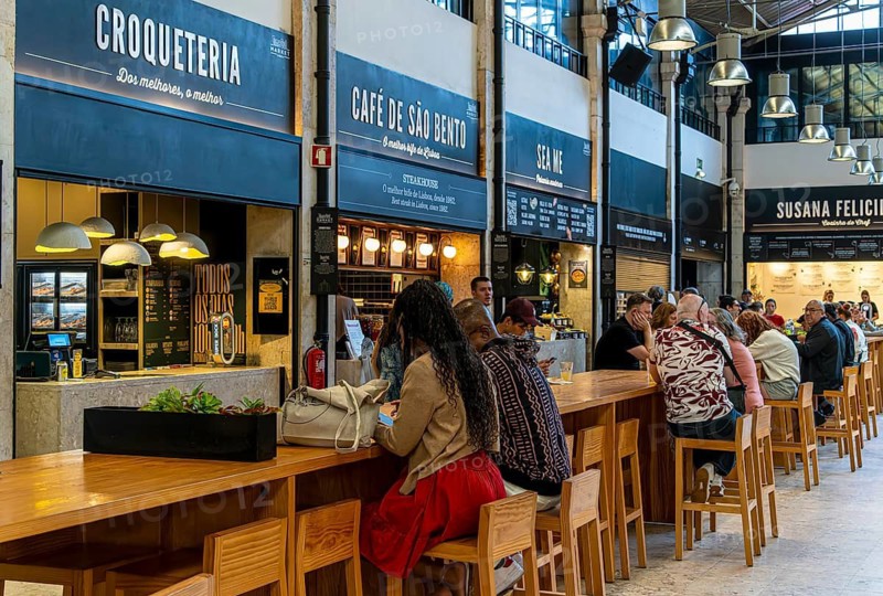 The Mercadeo da Ribeira, also known as TimeOut Market, is the best address for Portuguese specialties and international cuisine. Historic market hall at Cais do Sodré station, Lisbon, Portugal