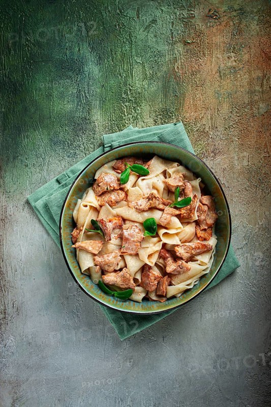 Papardelle pasta, with chanterelle mushrooms, in cream sauce, homemade, no people