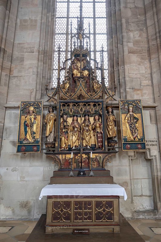 The cross altar from 1470 in the late Gothic hall church of St George, Dinkelsbühl, Bavaria, Germany