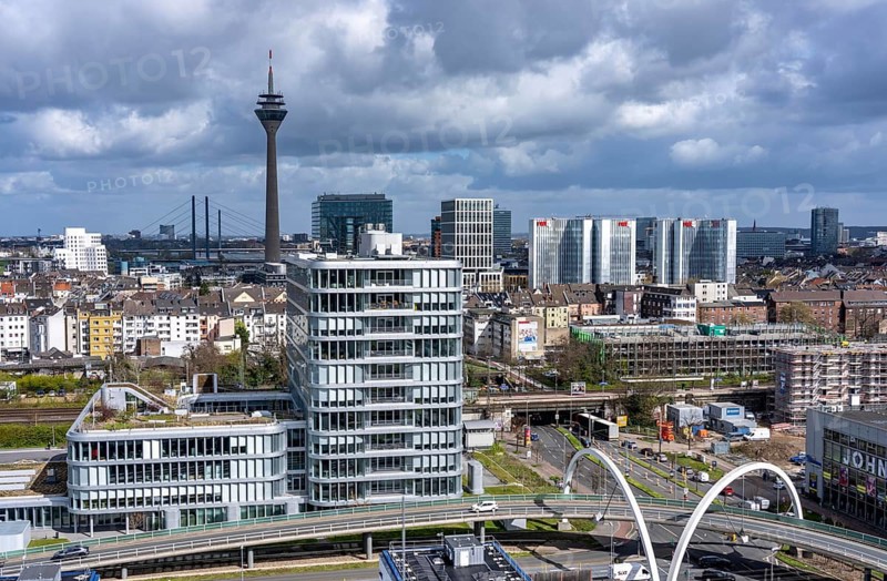 Skyline of buildings in downtown Düsseldorf, Rheinturm, Rheinbrücken, road bridge on Völklinger Straße, view from south to north, North Rhine-Westphalia, Germany