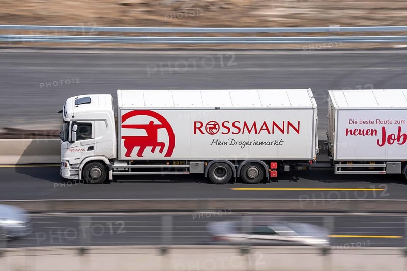 Freight truck for food logistics, on the motorway, Rossmann drugstore chain