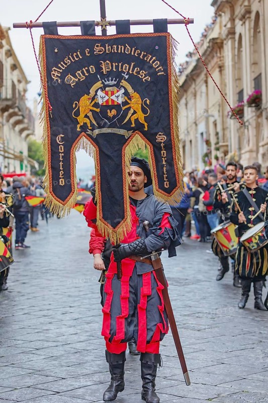 Participants wearing historical costumes on parade, Noto, Noto Valley, Sicily, Italy