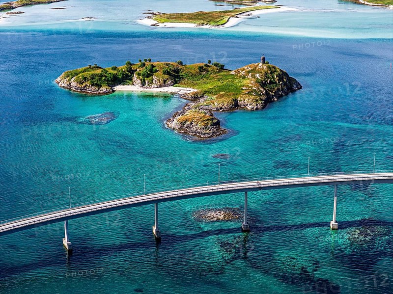 Sommaroy Bridge connecting Kvaloya Island to Sommaroy Island, small islands, turquoise water, aerial view, Norway