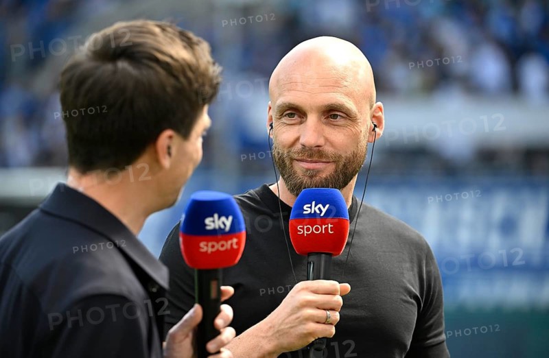 Sports Director Ole Book Borussia Dortmund BVB Portrait in an interview microphone Mikro Logo SKY soccer Bundesliga, PreZero Arena, Sinsheim, Baden-Württemberg, Germany