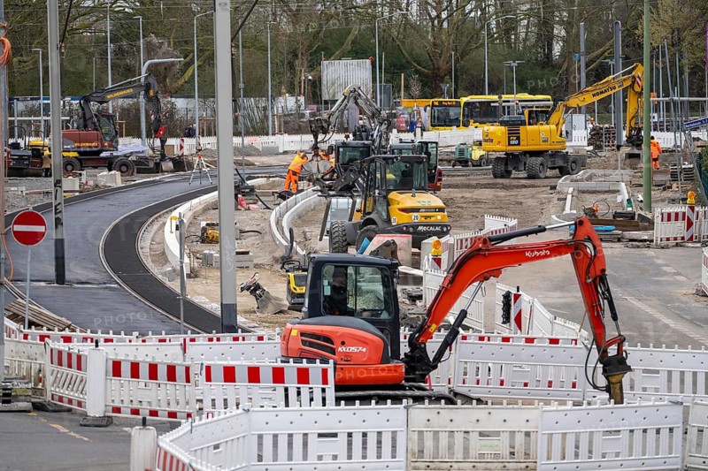 Large construction site in the city center of Essen, the large intersection of Hollesstraße and Steeler Straße is being completely rebuilt and renovated, supply lines, sewage, gas, water and the construction of new road infrastructure and new tracks for the new Stadtbahn-Essen, a new tram line in the city center, North Rhine-Westphalia, Germany