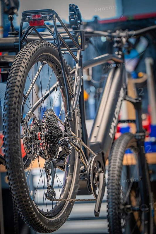 Black bicycle from behind, focussed on the rear wheel in a workshop, Waldbike Manufaktur, bicycle workshop, Calw, district of Calw, Black Forest, Germany