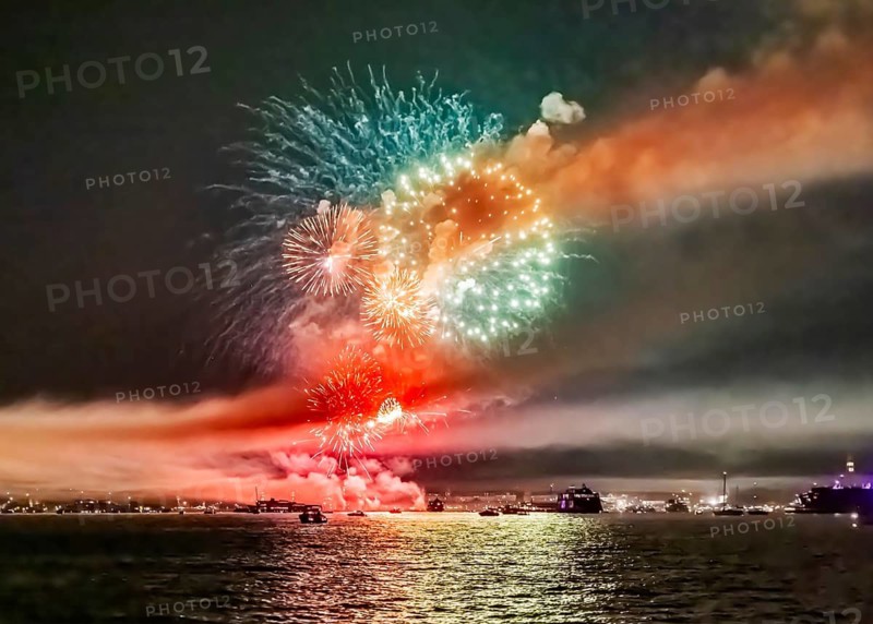 Lake Night Festival Constance. Water fireworks over the German shore and the neighbouring Swiss town of Kreuzlingen. View of the fireworks from Lake Constance. Constance, Baden-Württemberg, Germany