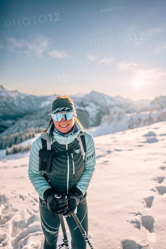 Hiking in the snow in the snow-covered winder landscape in the Alps at Neunerköpfle in the Tannheimer Tal in Tyrol, Austria