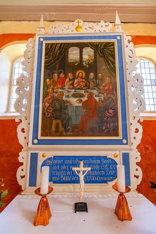 Altar with communion painting in the medieval fieldstone church of Zeuden, Fläming, Brandenburg, Germany