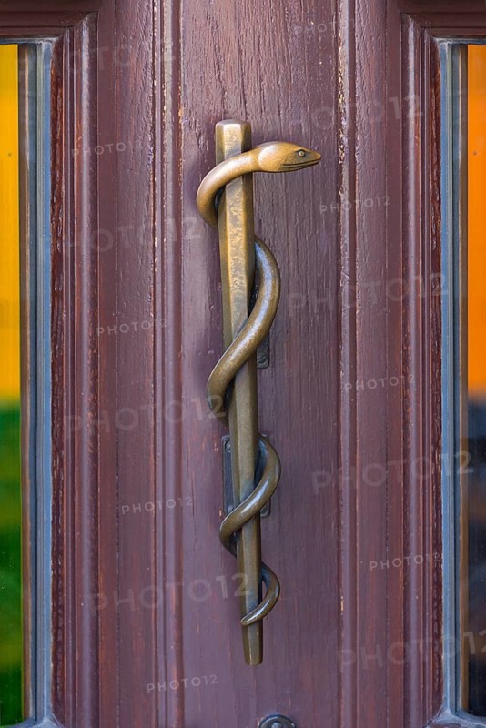 Brass Aesculapian staff as a door handle on a pharmacy, Erlangen, Middle Franconia, Bavaria, Germany