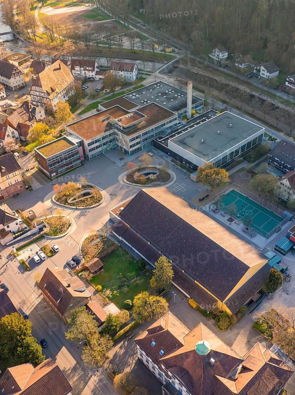 Bird's-eye view of a city with different architectures and natural areas in spring, Nagold, Black Forest, Germany